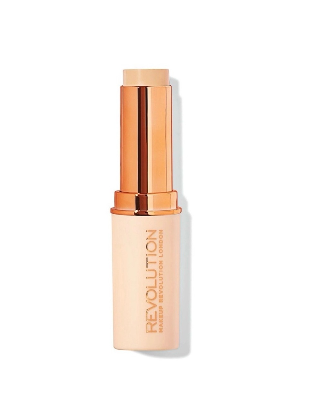 Revolution Fast Base Stick Foundation nude-colored twist-up tube F2